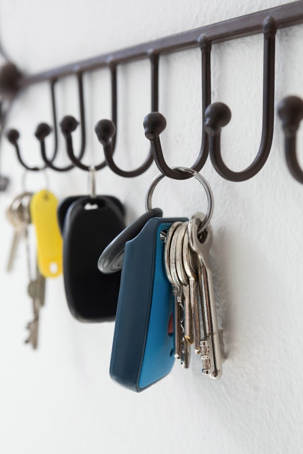 Keys hanging on a key holder, a tip to avoid needing an auto lockout service.